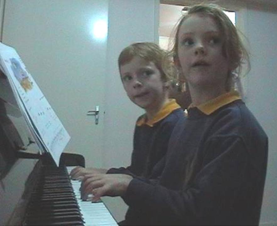 Kids on piano