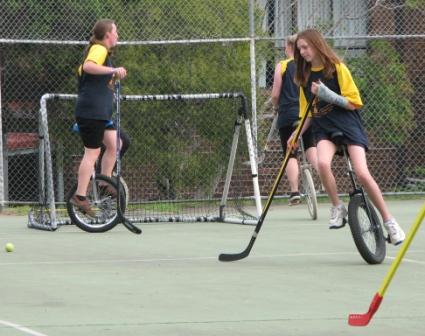 Abi playing hockey